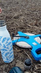 Fieldwork on the farm with a flask of tea.