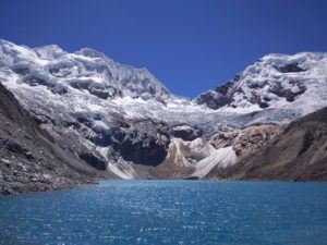 A glacier and a blue lake. 