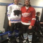 James and his friend in their ice hockey gear