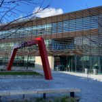 A glass building and archway