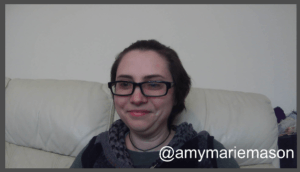 zoom screenshot of me, sitting on the sofa