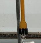 a piece of plastic under tension